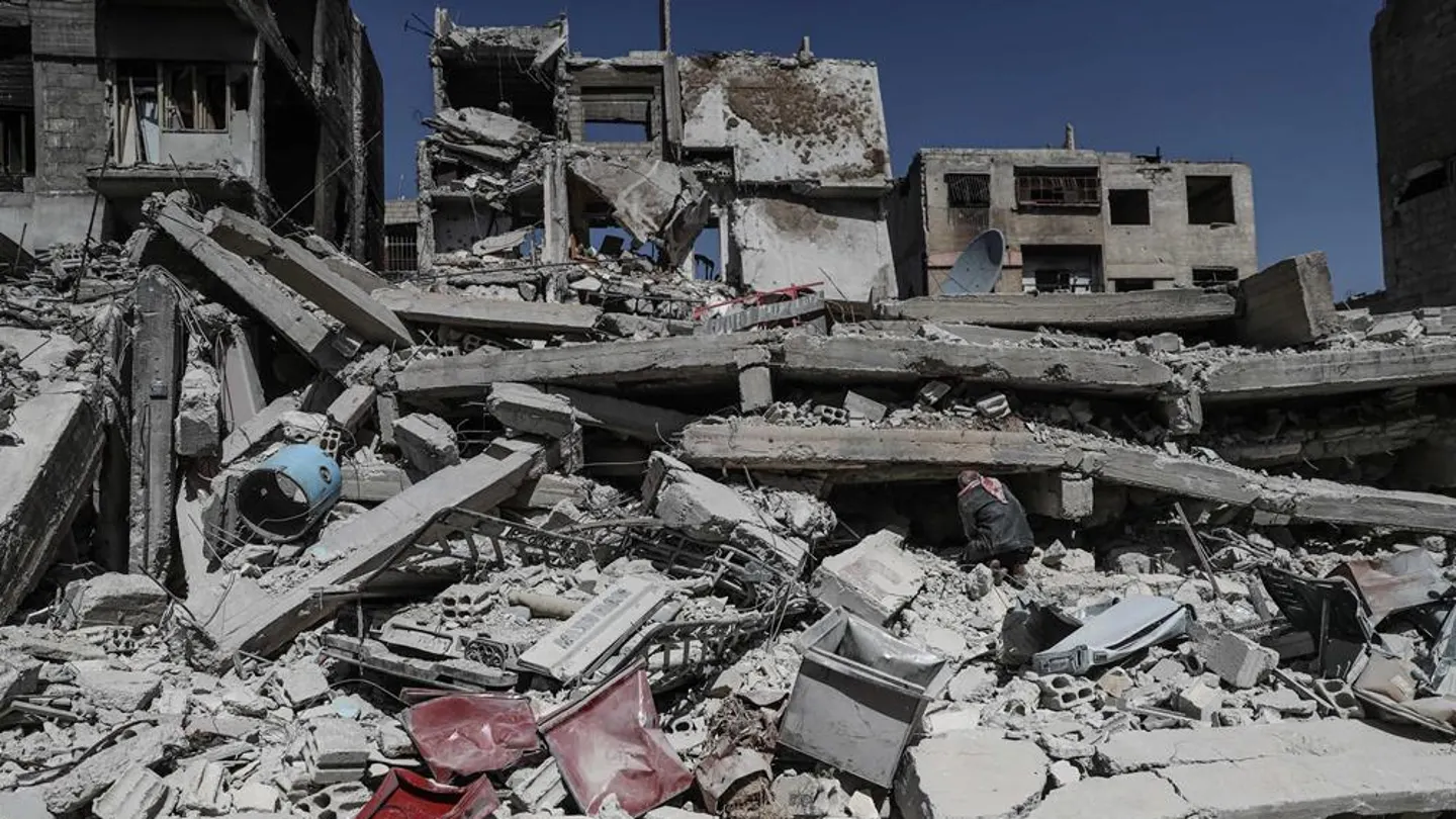 Escombros de unos edificios destruidos por las bombas en Duma, en el este de Guta Escombros de unos edificios destruidos por las bombas en Duma, en el este de Guta