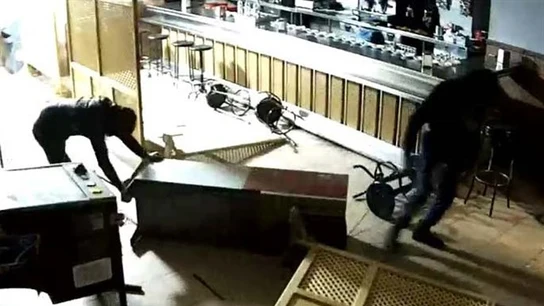 Imagen de archivo de un robo violento Imagen de archivo de un robo violento