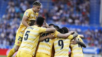Los jugadores del Girona celebran uno de los goles contra el Alavés