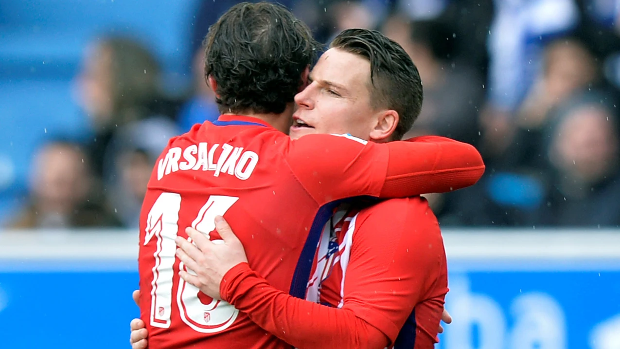 Gameiro se abraza a Vrsaljko