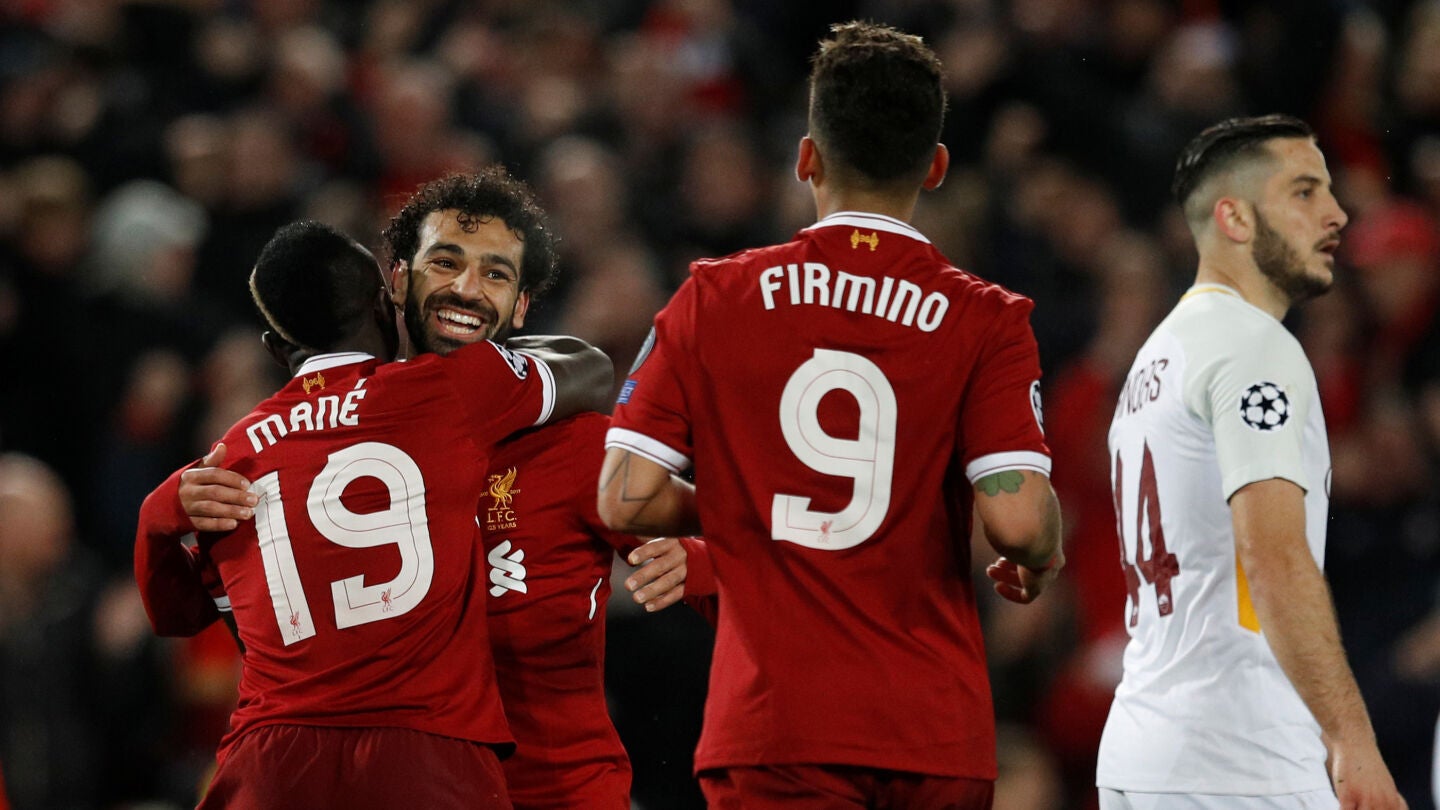 Man&eacute;, Salah y Firmino celebran un gol ante la Roma
