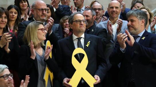 Quim Torra con un lazo amarillo
