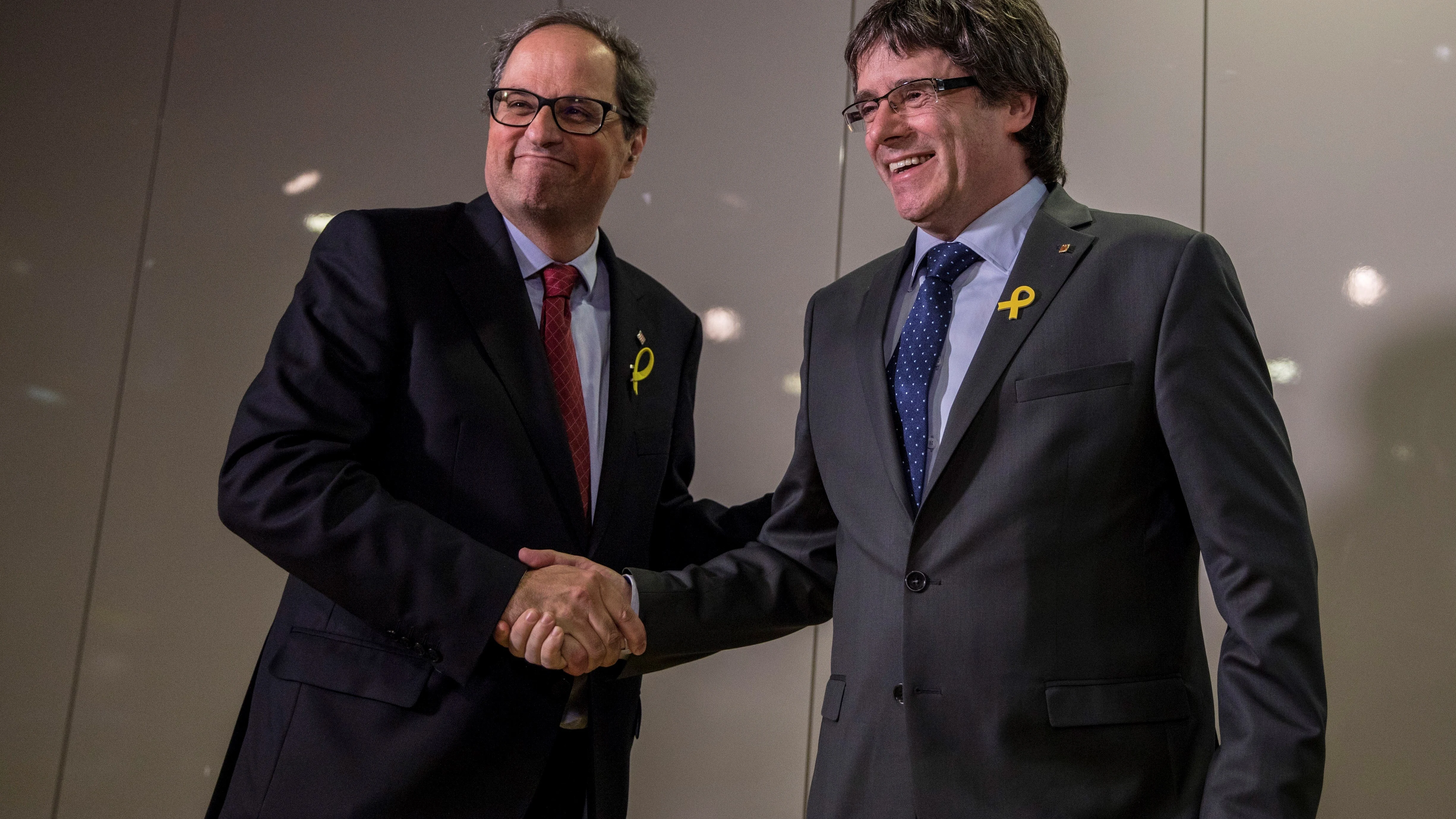 El president de la Generalitat, Quim Torra, y el expresident Carles