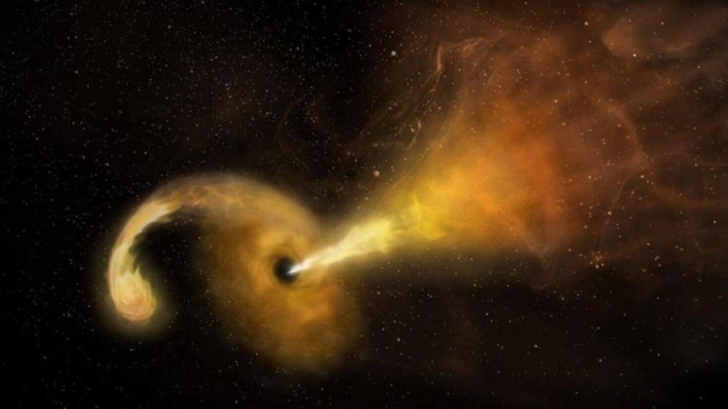 Recreaci&oacute;n art&iacute;stica de la erupci&oacute;n de un agujero negro tras engullir una estrella