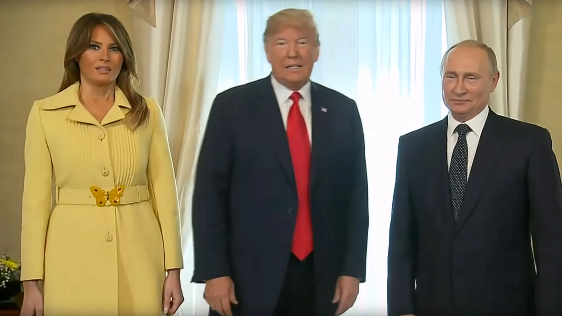 Melania y Donald Trump junto a Putin