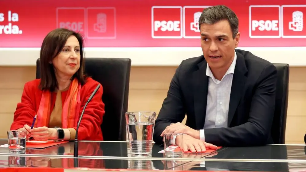 Margarita Robles y Pedro Sánchez