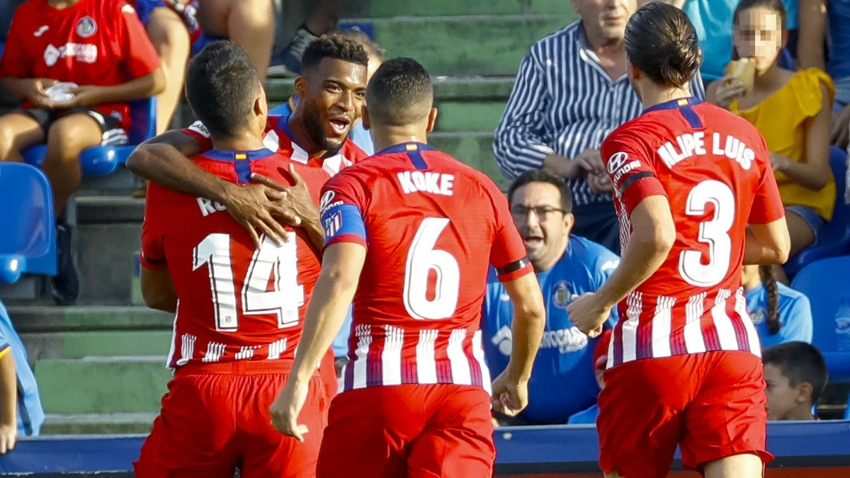 Lemar celebra un gol del Atlético