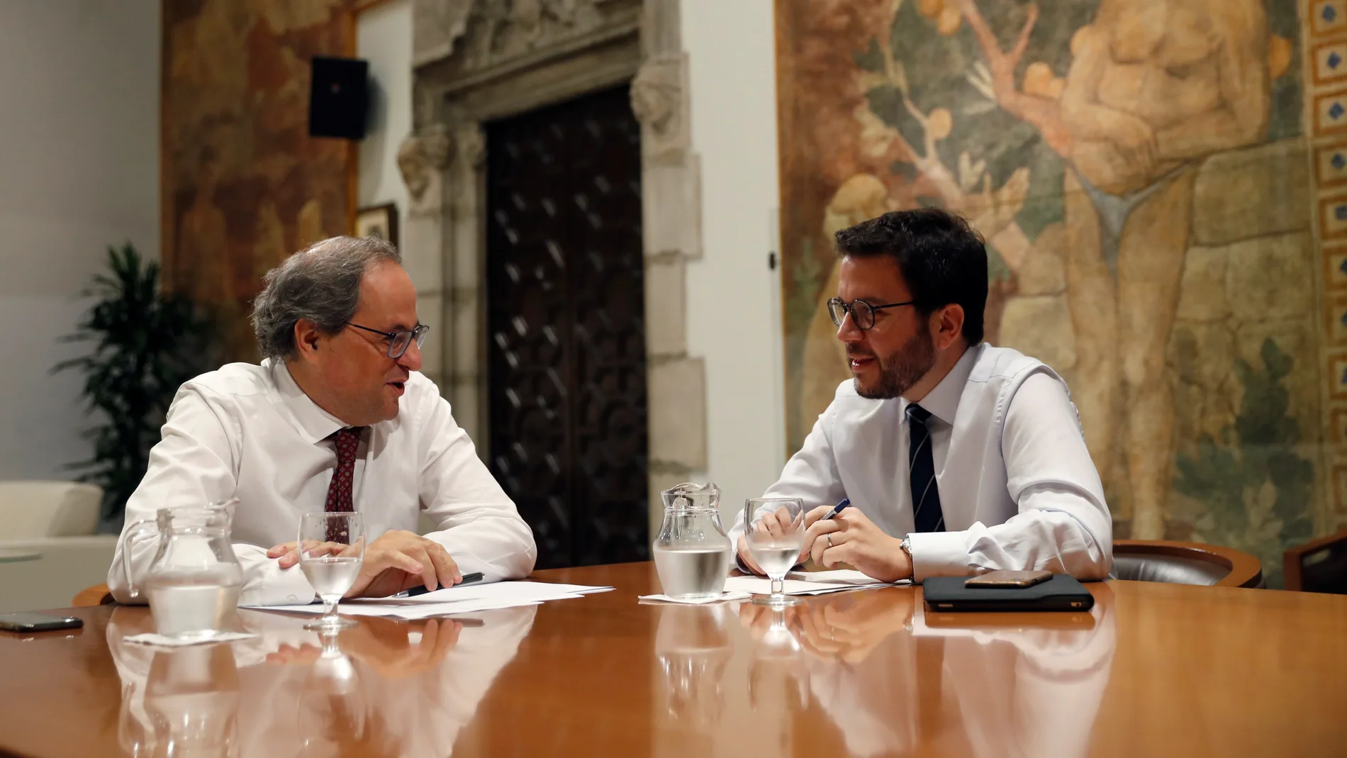 El presidente de la Generalitat, Quim Torra (JxCAT), y su vicepresidente, Pere Aragonès (ERC),