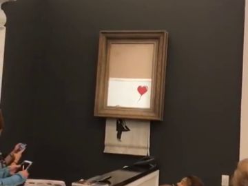 El cuadro de Banksy autodestruyéndose El cuadro de Banksy autodestruyéndose