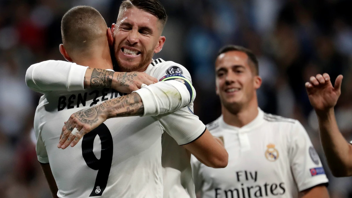 Benzema y Ramos celebran un gol