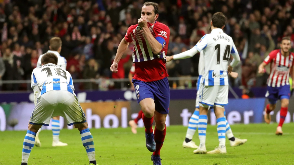 Diego Godín celebra un gol