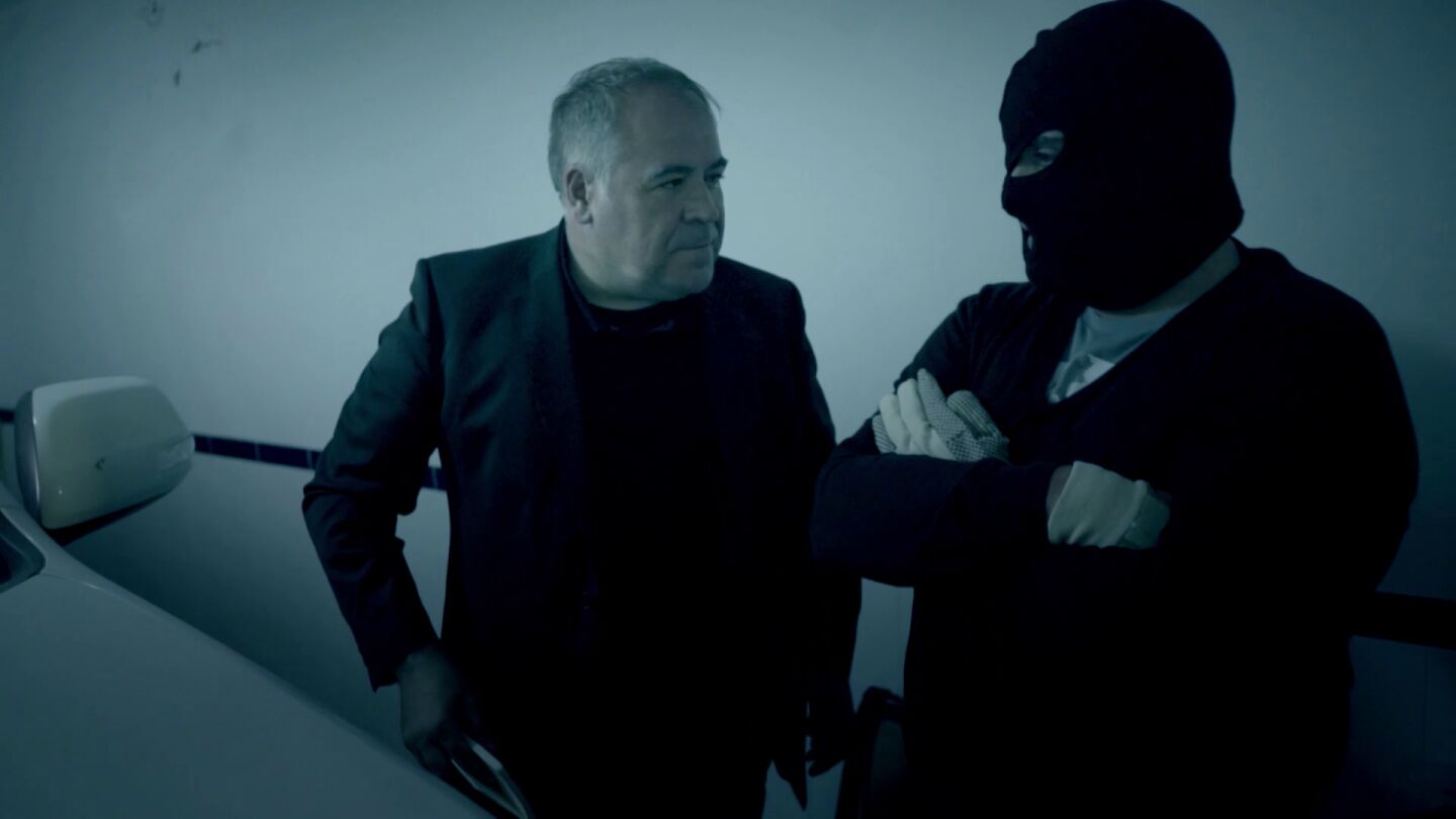 Antonio Garc&iacute;a Ferreras habla con un transportista de droga