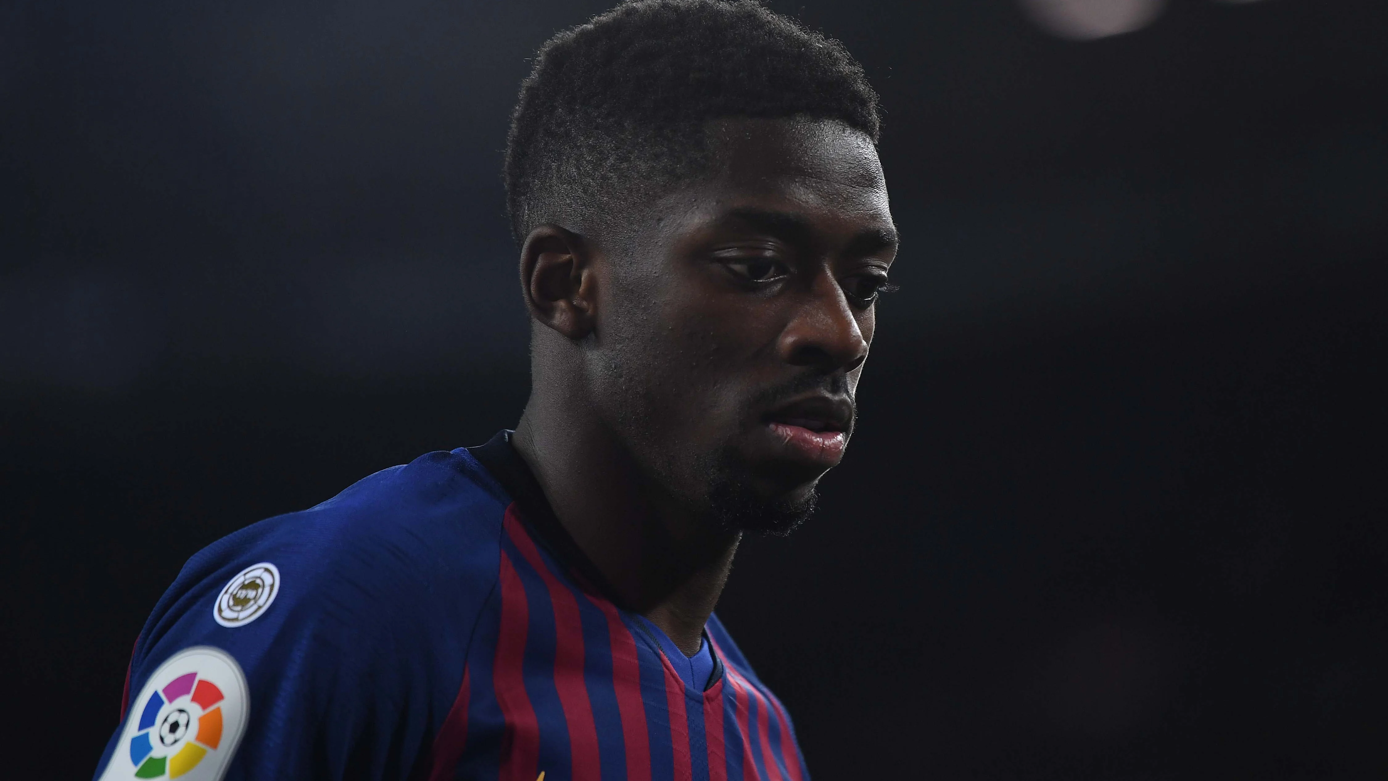 Dembelé, durante un partido con el Barça