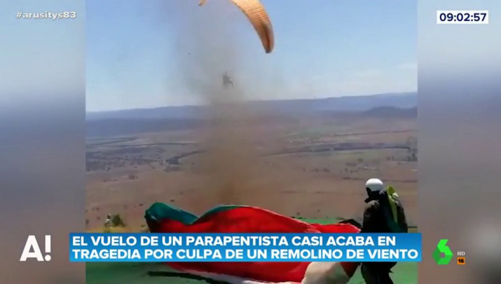 Parapentista se topa con un remolino de viento Parapentista se topa con un remolino de viento