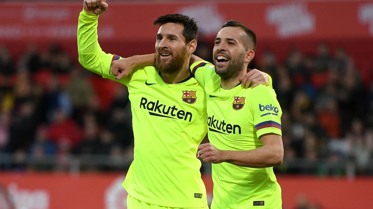 Messi celebra un gol con Jordi Alba