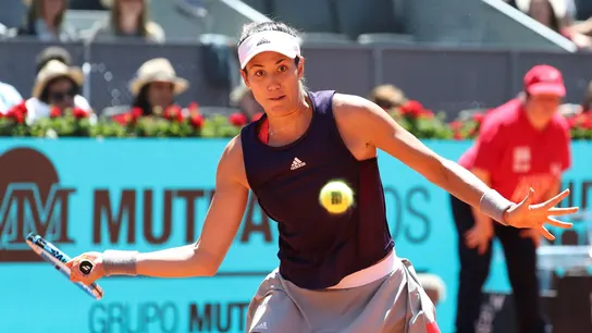 Garbiñe Muguruza devuelve una bola en un partido Garbiñe Muguruza devuelve una bola en un partido