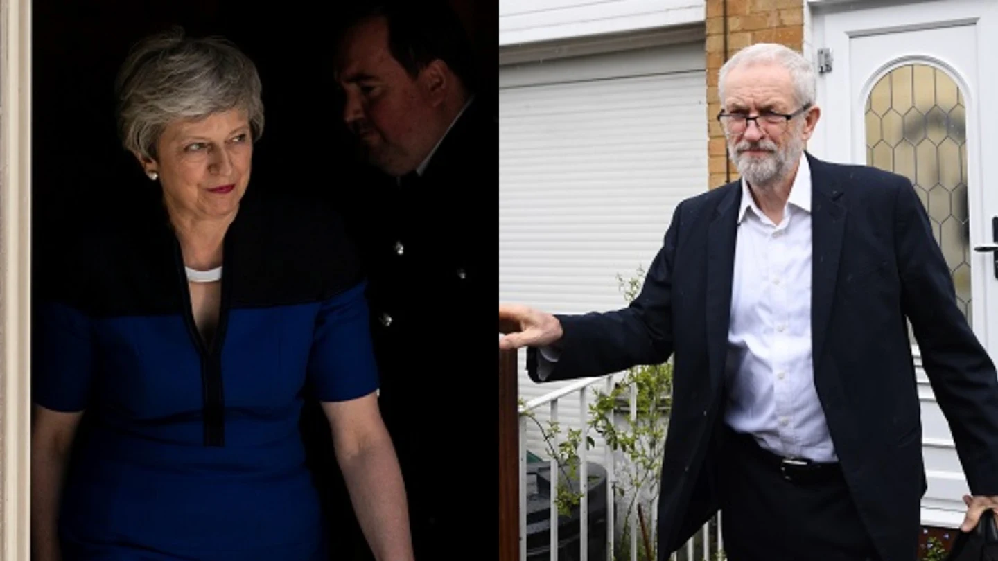 Theresa May y Jeremy Corbyn en fotos de archivo Theresa May y Jeremy Corbyn en fotos de archivo