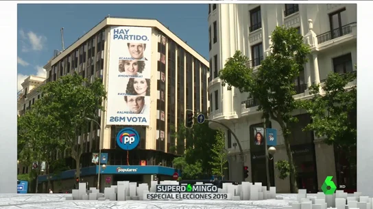 Una nueva lona con la foto de los candidatos cubre la fachada del PP en Génova Una nueva lona con la foto de los candidatos cubre la fachada del PP en Génova