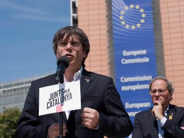 Carles Puigdemont en un acto electoral junto a Torra