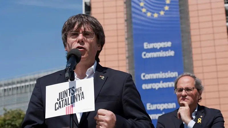 Carles Puigdemont en un acto electoral junto a Torra