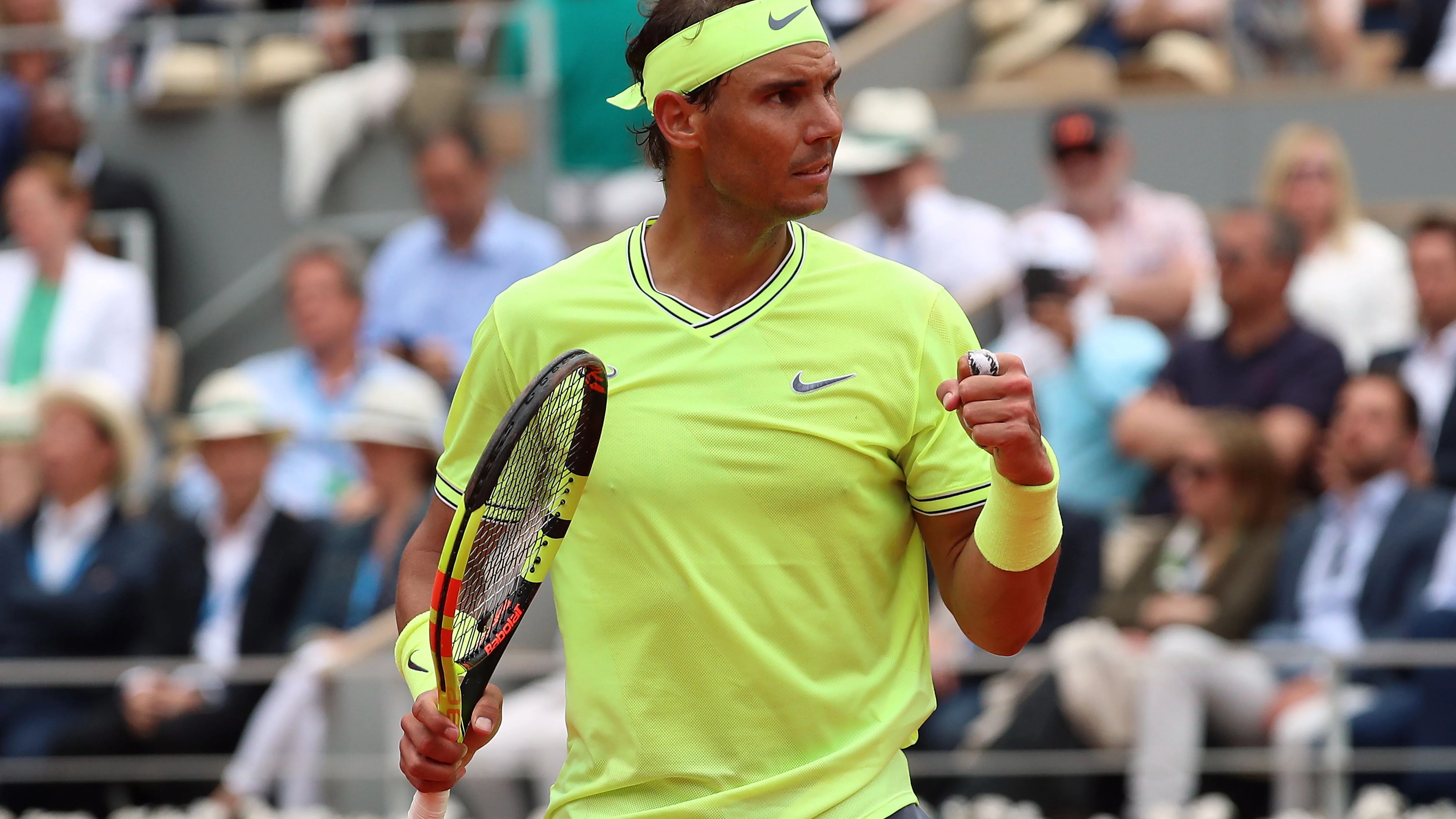 Nadal celebra un punto ante Thiem en la final de Roland Garros