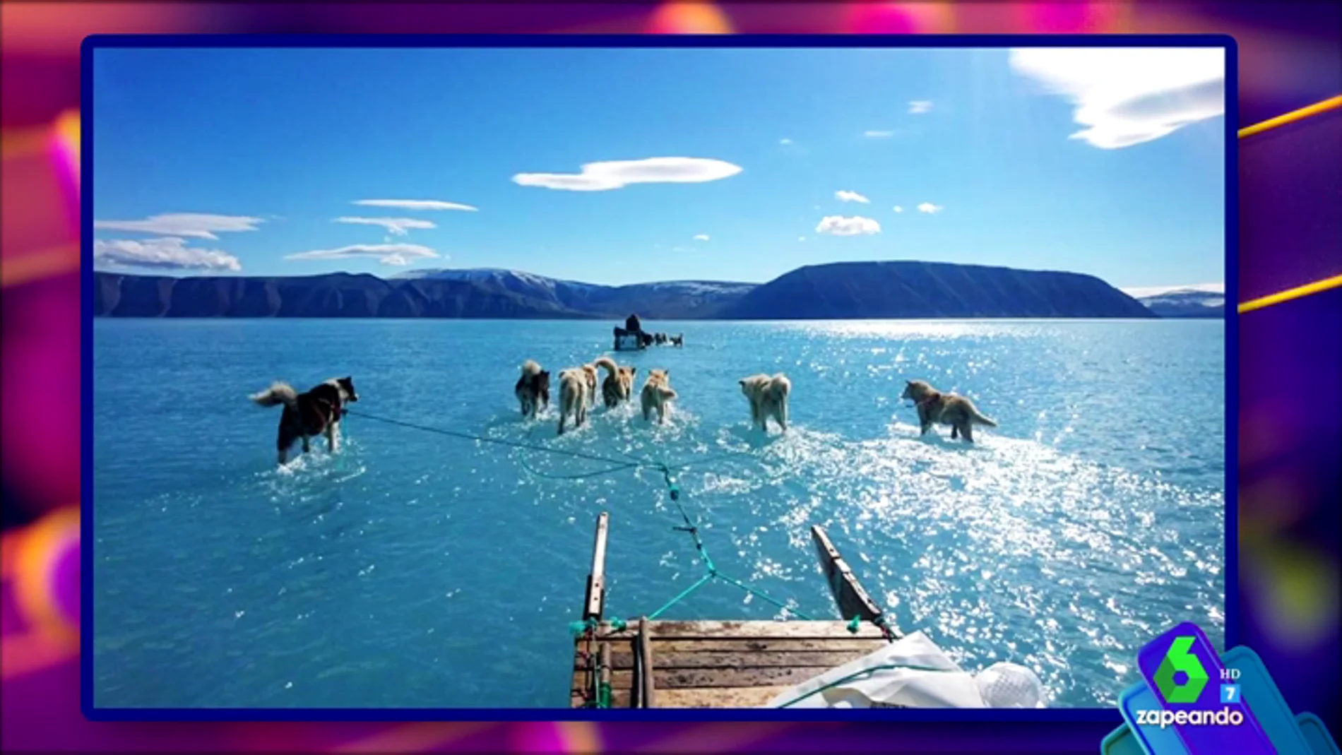 La imagen que mejor refleja el drama del cambio climático: un grupo de perros corriendo sobbre hielo derretido en Groenlandia
