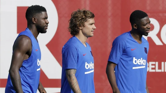 Griezmann, con Umtiti y Dembelé Griezmann, con Umtiti y Dembelé