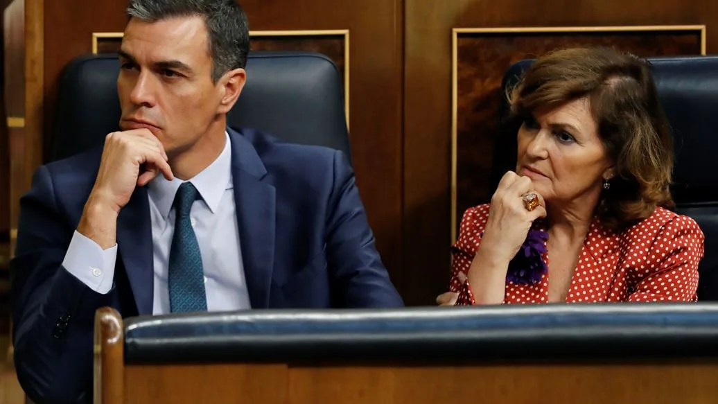 Pedro Sánchez y Carmen Calvo