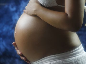 Imagen de archivo de una mujer embarazada. Imagen de archivo de una mujer embarazada.