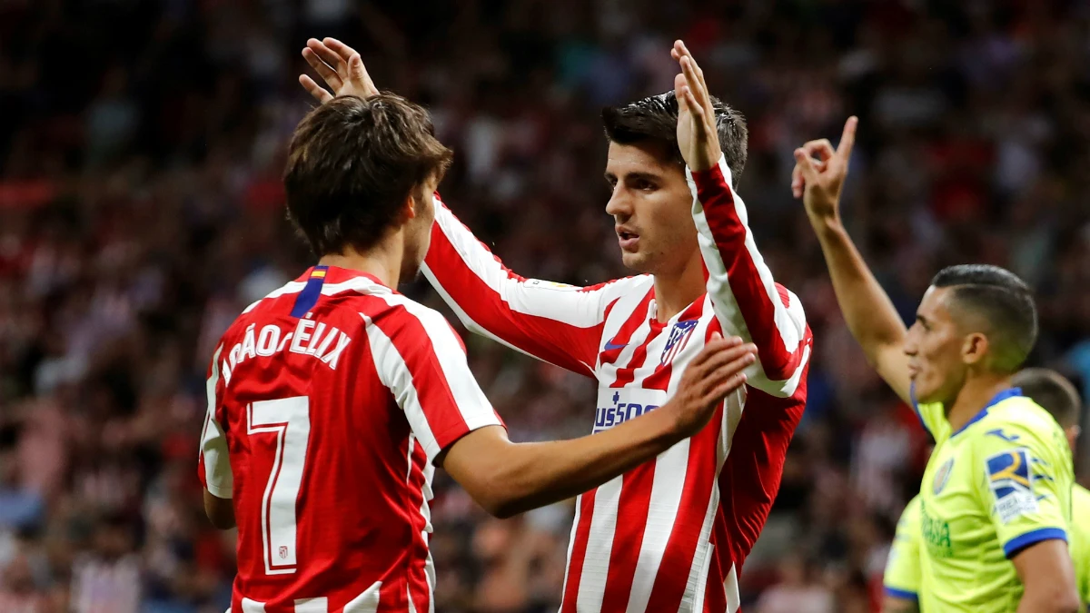 Joao Félix y Morata celebran un gol