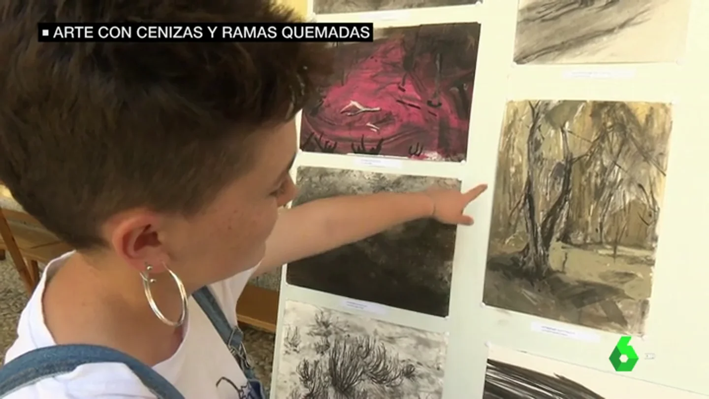 Unos jóvenes convierten en arte la sierra de Guadarrama calcinada por el incendio Unos jóvenes convierten en arte la sierra de Guadarrama calcinada por el incendio