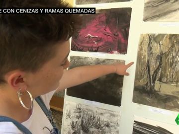 Unos jóvenes convierten en arte la sierra de Guadarrama calcinada por el incendio Unos jóvenes convierten en arte la sierra de Guadarrama calcinada por el incendio