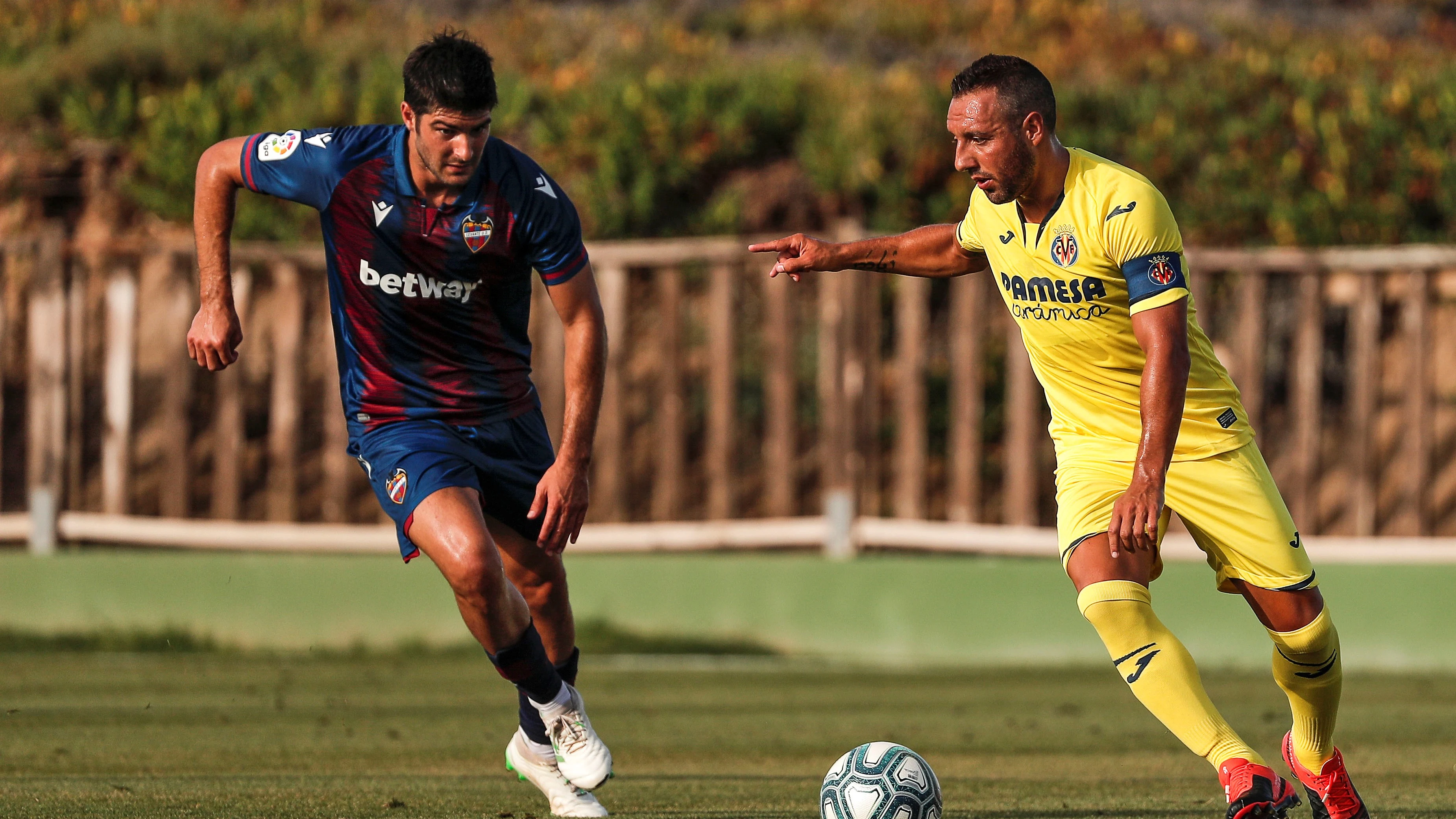 Melero y Cazorla, durante un amistoso de pretemporada