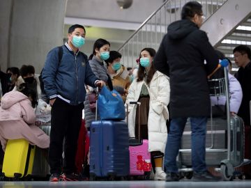 Un pasajero obliga a su avión a regresar a Toronto en pleno vuelo al bromear con tener el coronavirus Un pasajero obliga a su avión a regresar a Toronto en pleno vuelo al bromear con tener el coronavirus