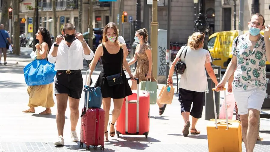Un grupo de visitantes en las Ramblas