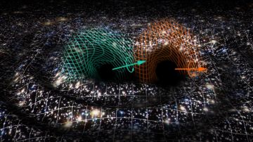 La fusion de dos agujeros negros en otro supermasivo desconcierta a la comunidad astrofisica