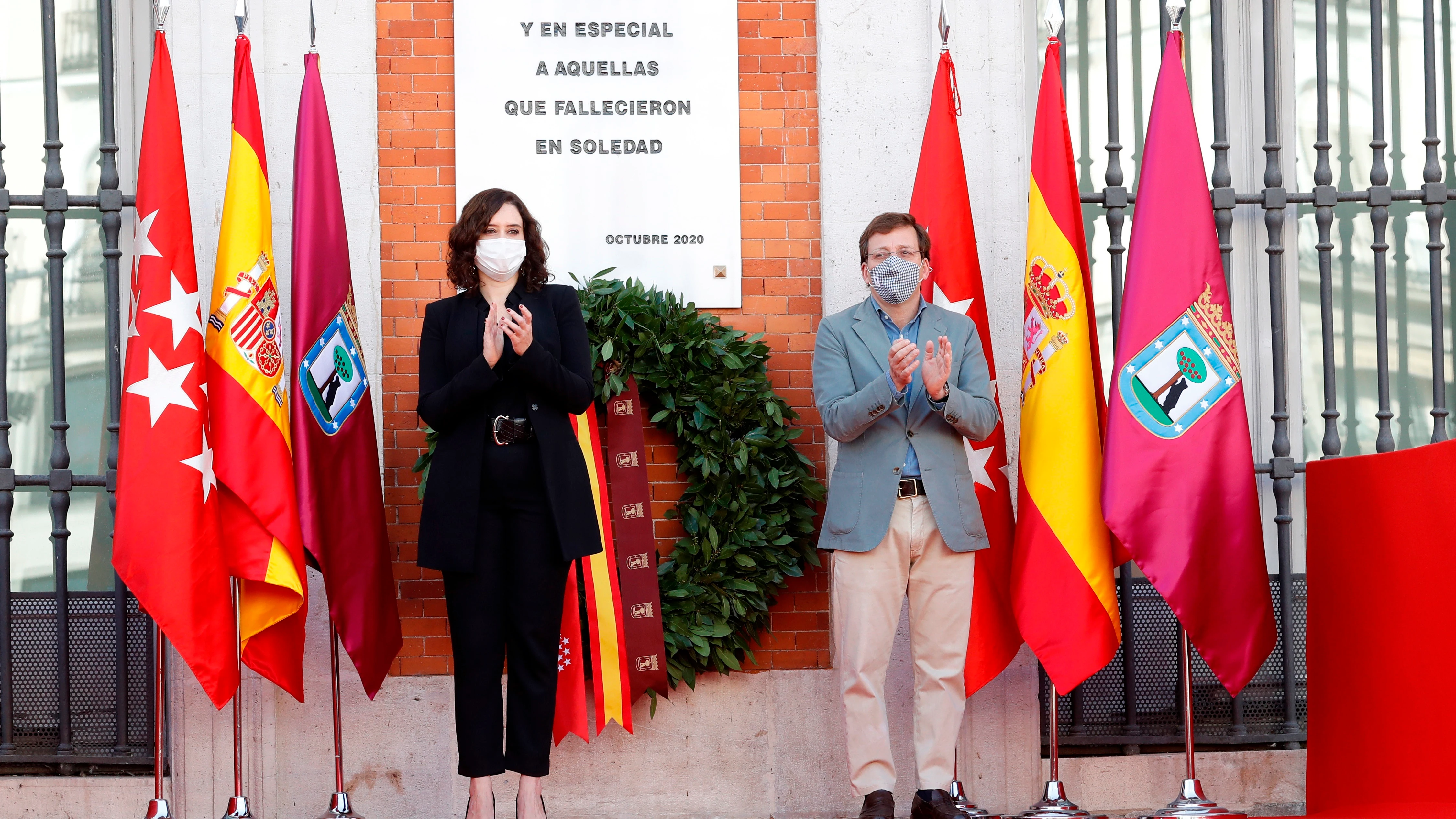 Isabel Díaz Ayuso y José Luis Martínez-Almeida, durante el homenaje de la Comunidad de Madrid a las víctimas de la COVID-19