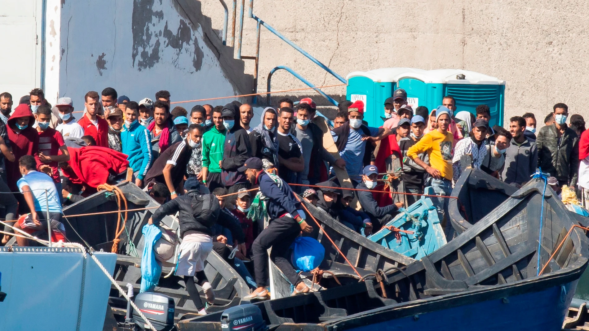 Inmigrantes en el puerto de Arguineguín