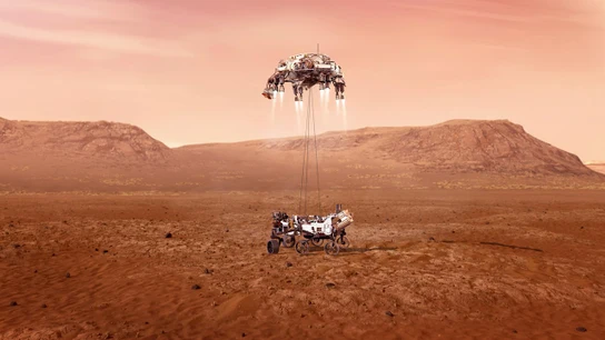 Fotografía cedida por la Administración Nacional de Aeronáutica y el Espacio (NASA) que muestra una ilustración del rover Perseverance mientras aterriza de forma segura sobre la superficie de Marte Fotografía cedida por la Administración Nacional de Aeronáutica y el Espacio (NASA) que muestra una ilustración del rover Perseverance mientras aterriza de forma segura sobre la superficie de Marte