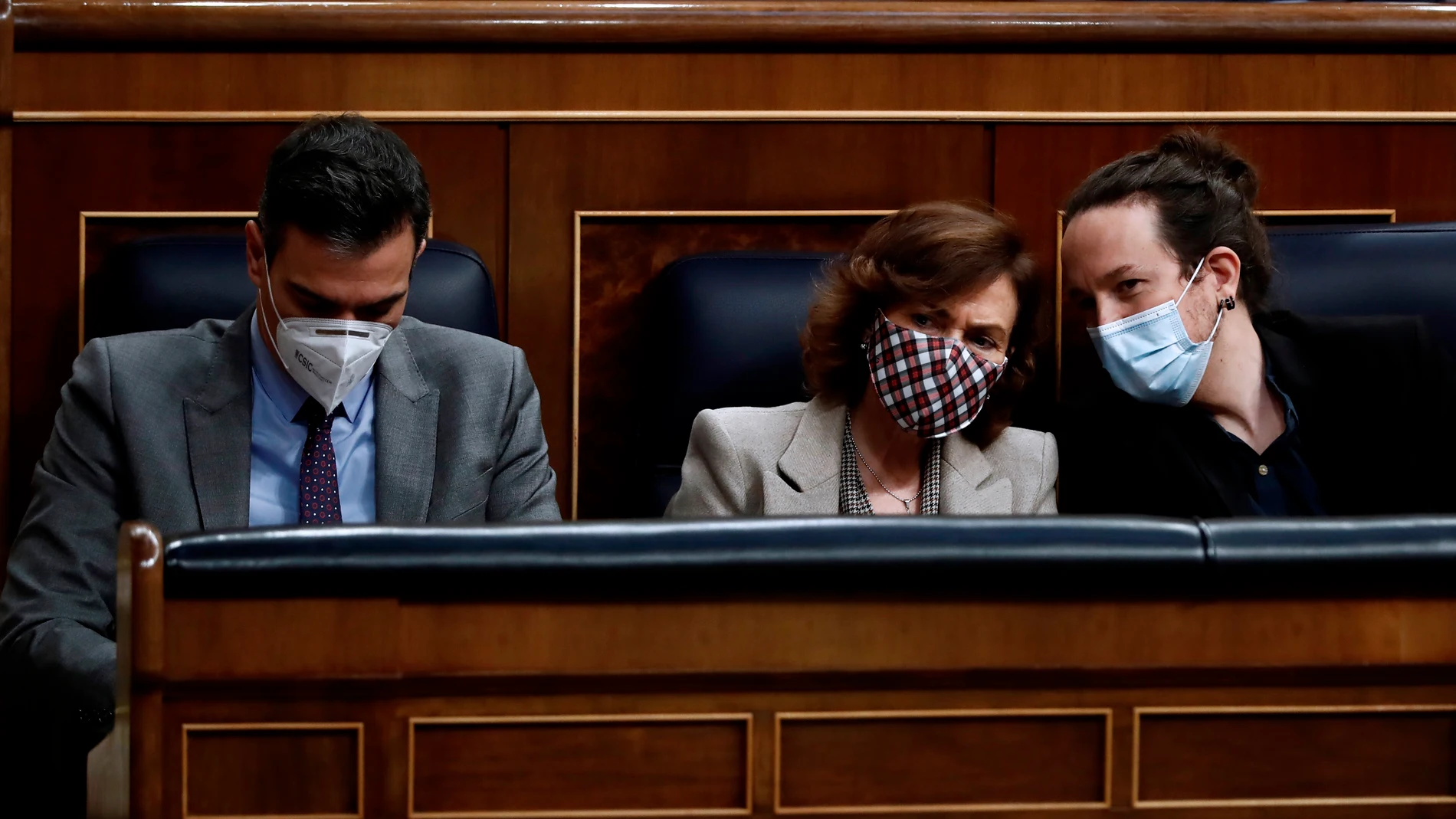 Pedro Sánchez, Carmen Calvo y Pablo Iglesias, en el Congreso de los Diputados