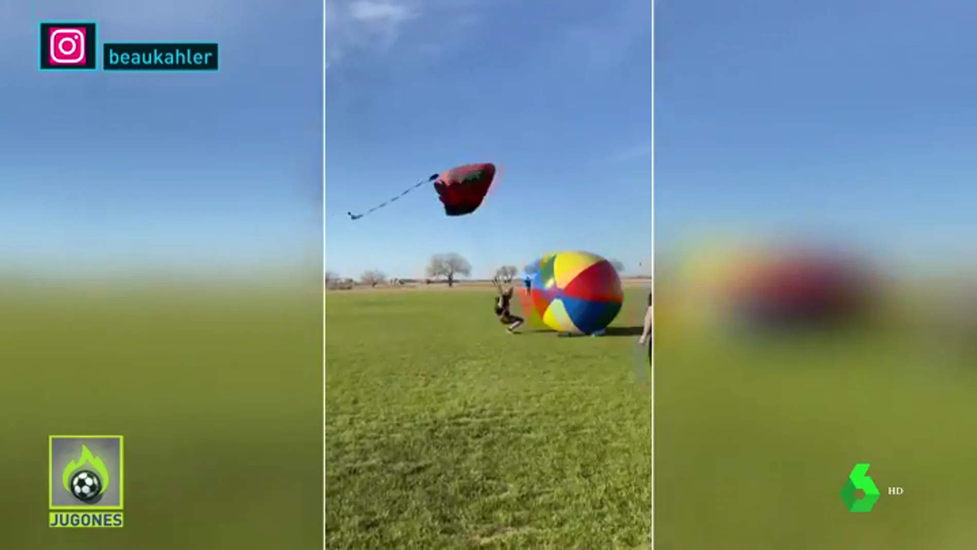 El inesperado aterrizaje de un parapentista: ¡choca contra un balón gigante!