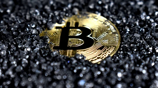 Una pieza de Bitcoin. Una pieza de Bitcoin.