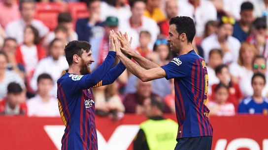 Messi y Busquets Messi y Busquets