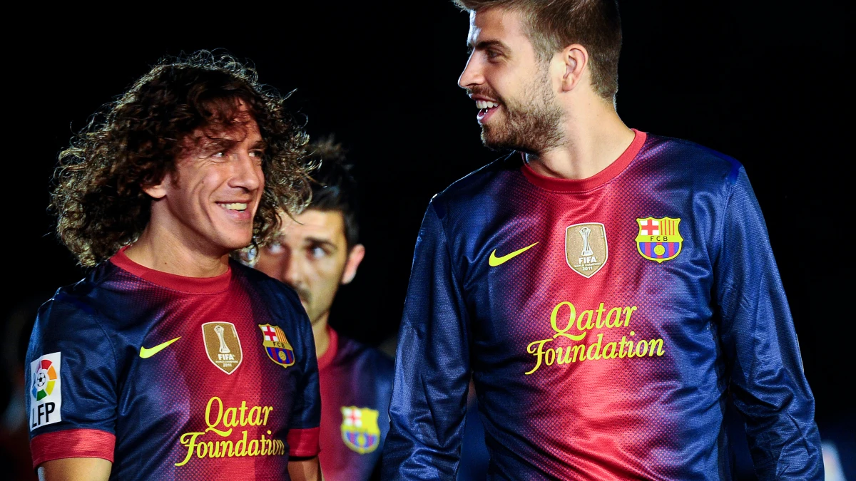 Puyol y Piqué, con el Barça