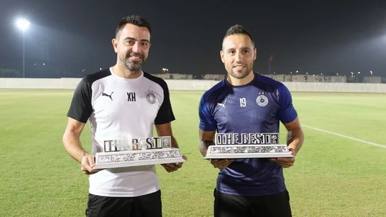 Xavi Hernández y Santi Cazorla Xavi Hernández y Santi Cazorla