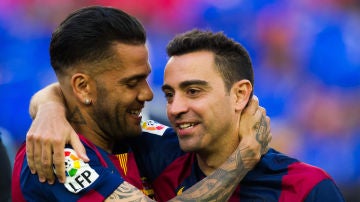 Dani Alves y Xavi Hernández