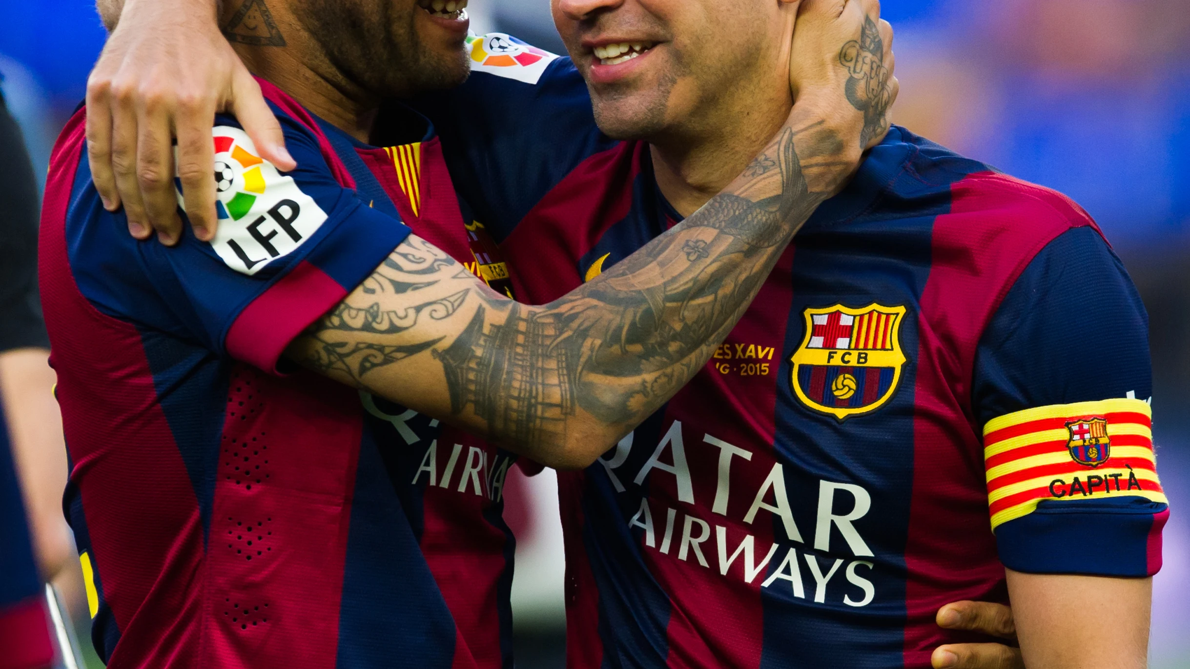 Dani Alves y Xavi Hernández