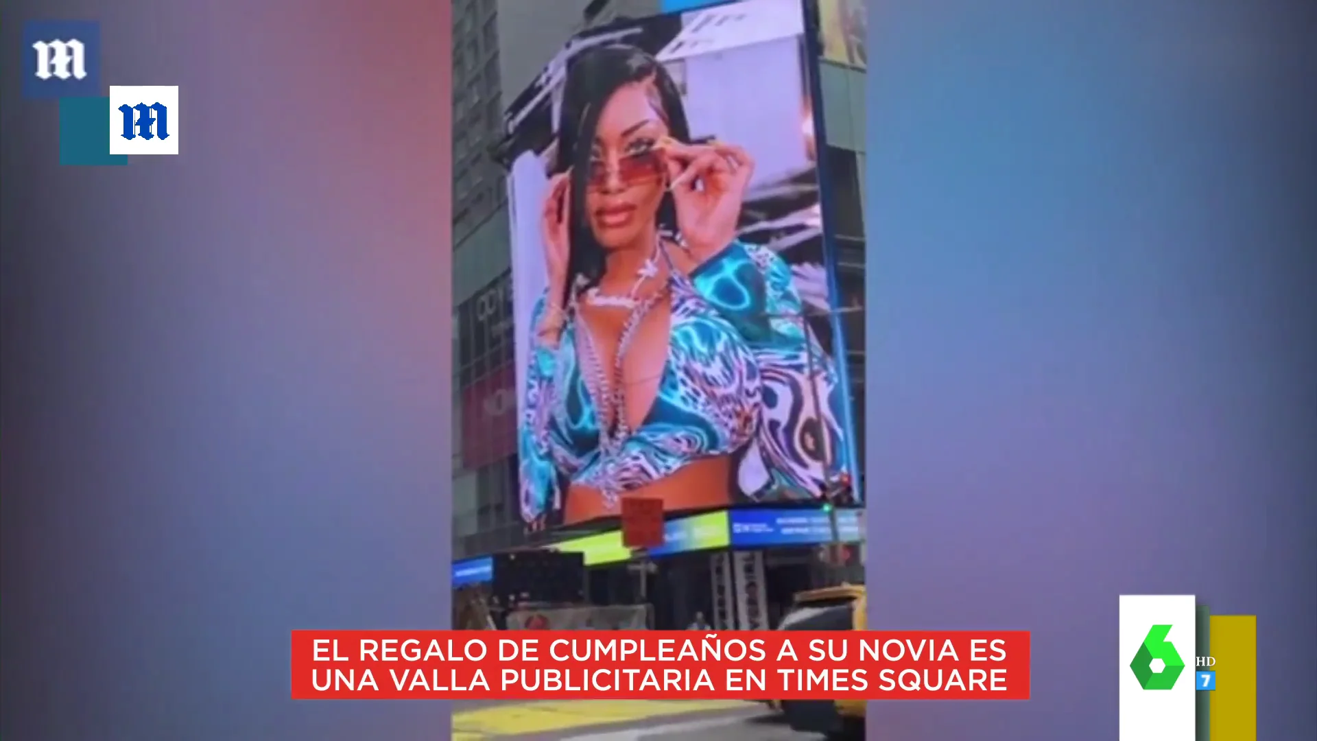 Imagen de una mujer en una valla publicitaria