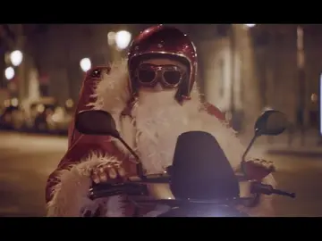 Campaña publicitaria de Papá Noel en moto Campaña publicitaria de Papá Noel en moto