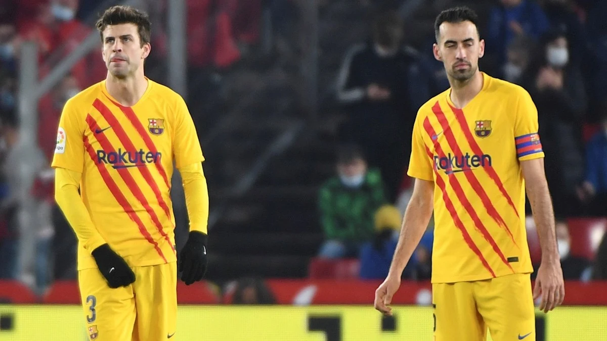 Piqué y Busquets, contrariados